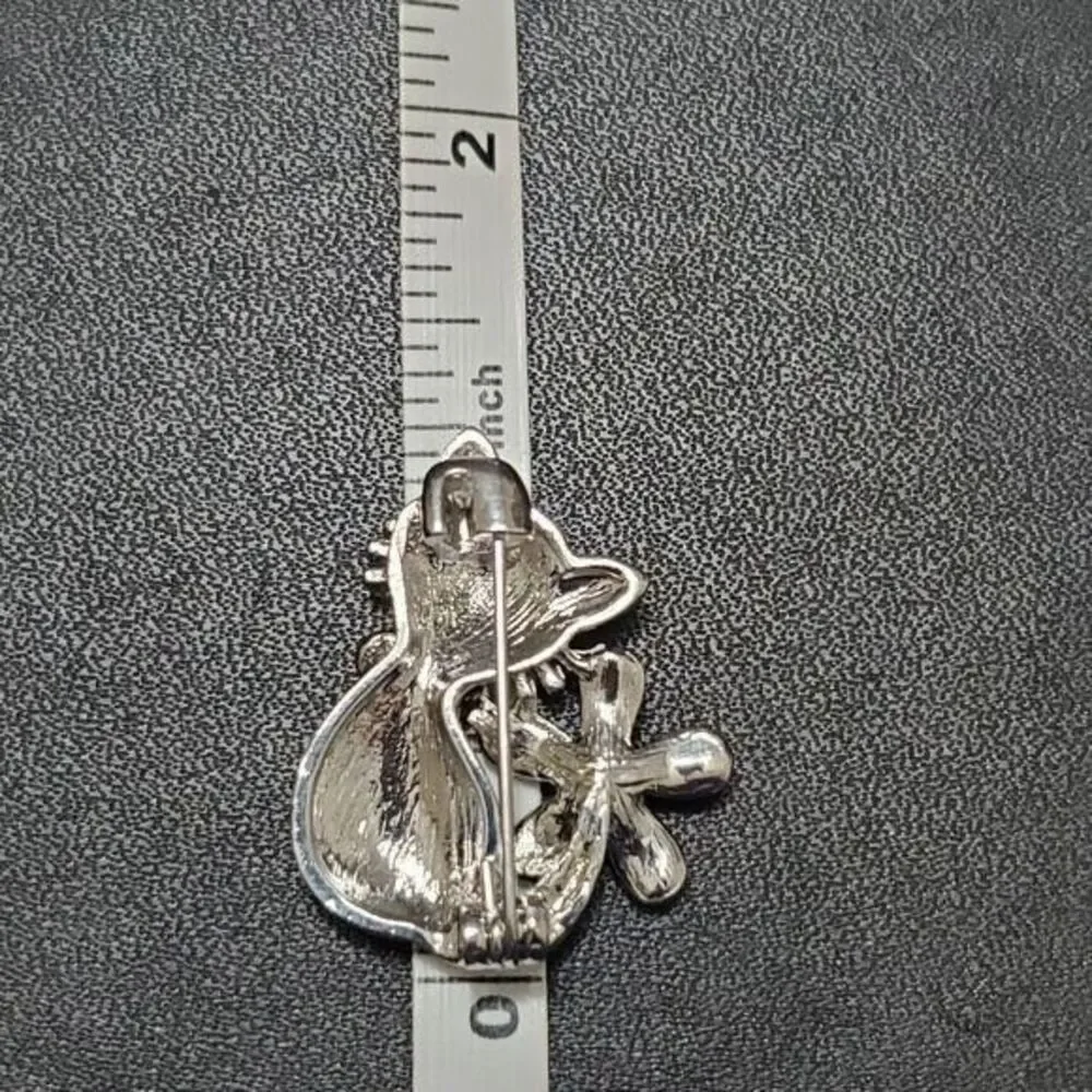Black enamel kitty cat brooch